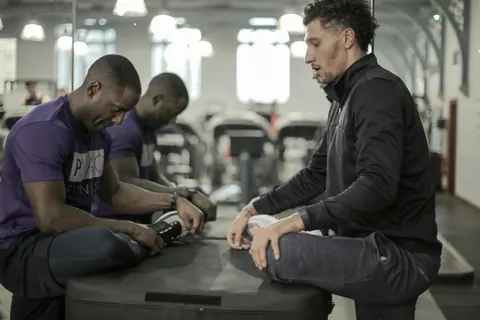 Peter Mac with Jay Bothroyd during a stretching session in the gym